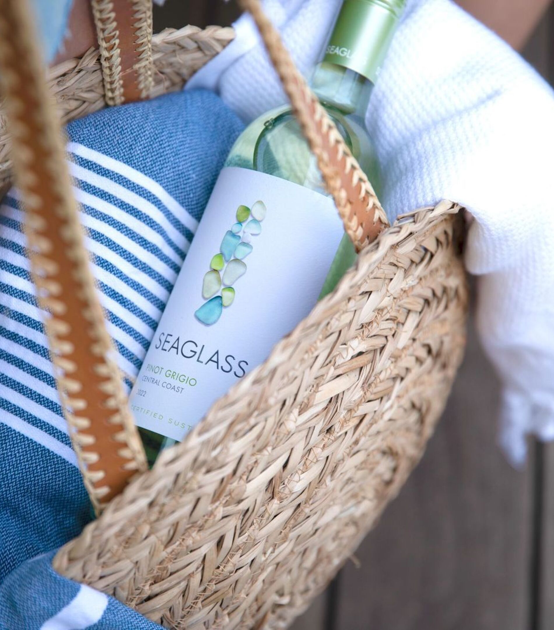 A bottle of Seaglass Central Coast Pinot Grigio white wine in a basket